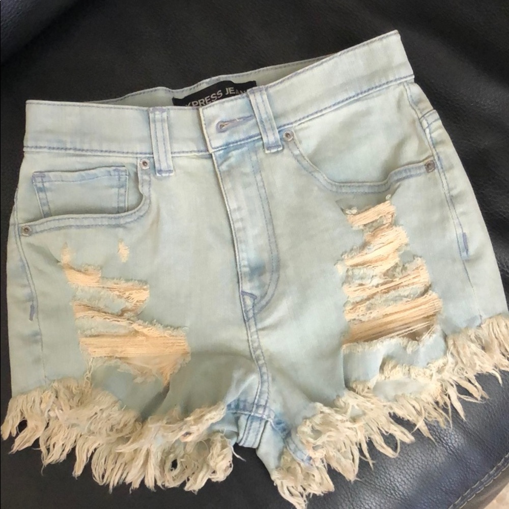 Express jean ripped shorts. Never Worn. Size 4